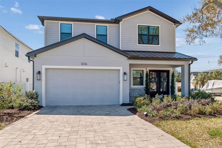 Front exterior of a new home in , Tampa, FL, highlighting curb appeal (Image 21).