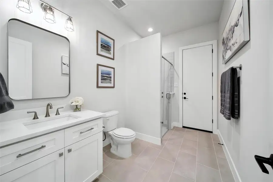 Furnished interior view inside a new home in ARTAVIA, Conroe (Image 35).