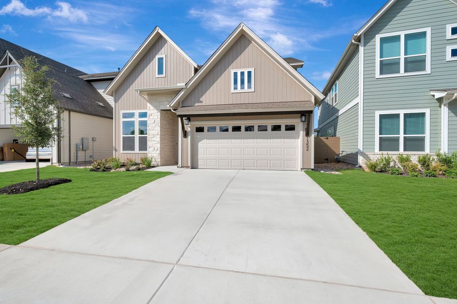 Front exterior of a new home in Double Creek Crossing, Round Rock, TX, highlighting curb appeal (Image 2). Front exterior of a new home in Double Creek Crossing, Round Rock, TX, highlighting curb appeal (Image 2).
