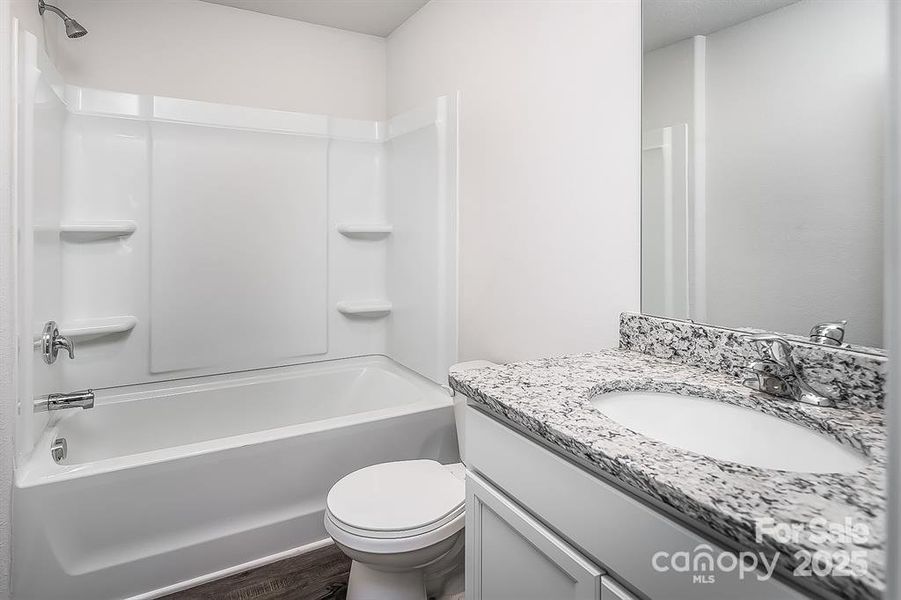 Furnished interior view inside a new home in McKee Creek Village, Charlotte (Image 8).