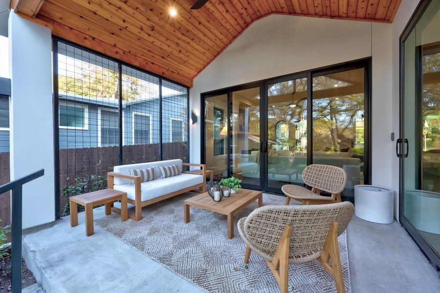 Sunroom / solarium featuring wood ceiling and high vaulted ceiling Sunroom / solarium featuring wood ceiling and high vaulted ceiling