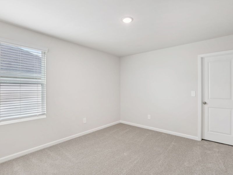 Spacious, unfurnished interior of a new home in River Glen, Angier (Image 20).