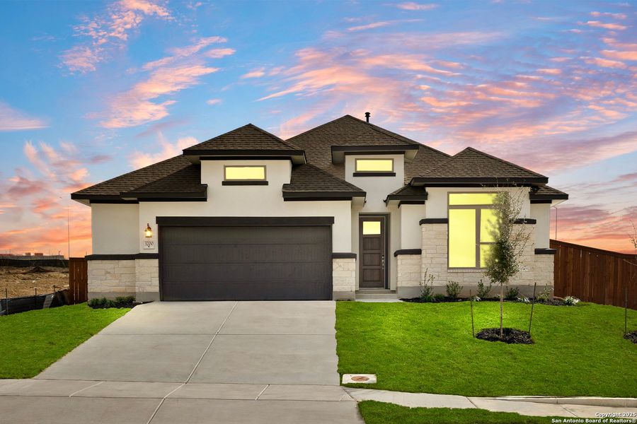 Front exterior of a new home in Homestead, Schertz, TX, highlighting curb appeal (Image 1).