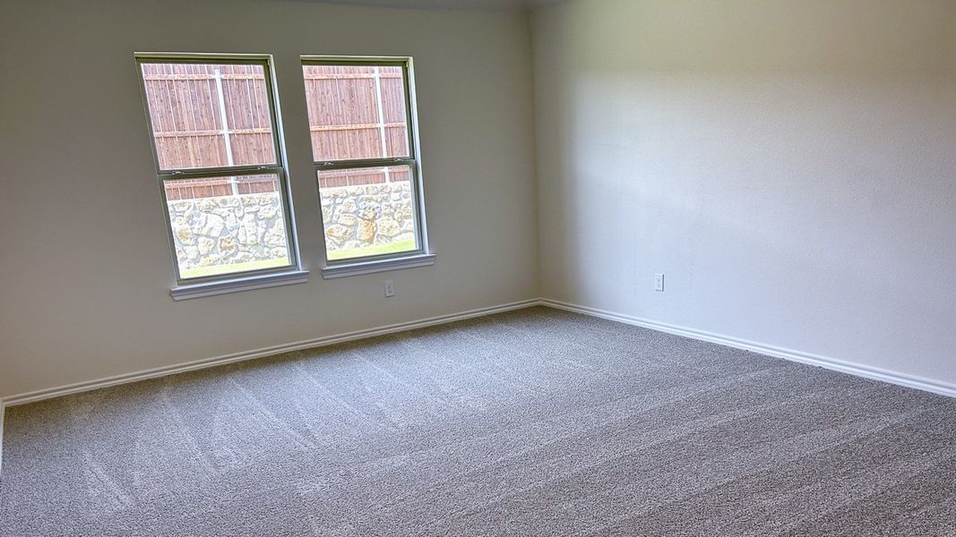 Representative unfurnished interior of a home built from the GARLAND by D.R. Horton in Northspur, Forney (Image 10).
