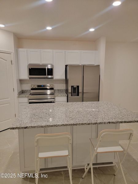 Furnished interior view inside a new home in , Jacksonville (Image 7).