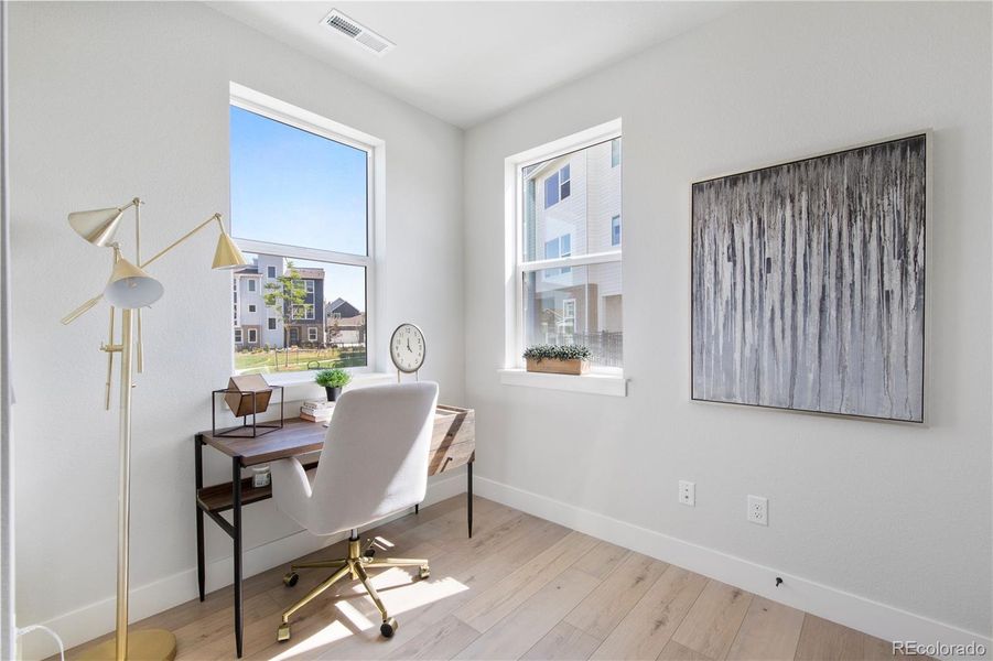 Furnished interior view inside a new home in Dillon Pointe - Skyview, Broomfield (Image 12).