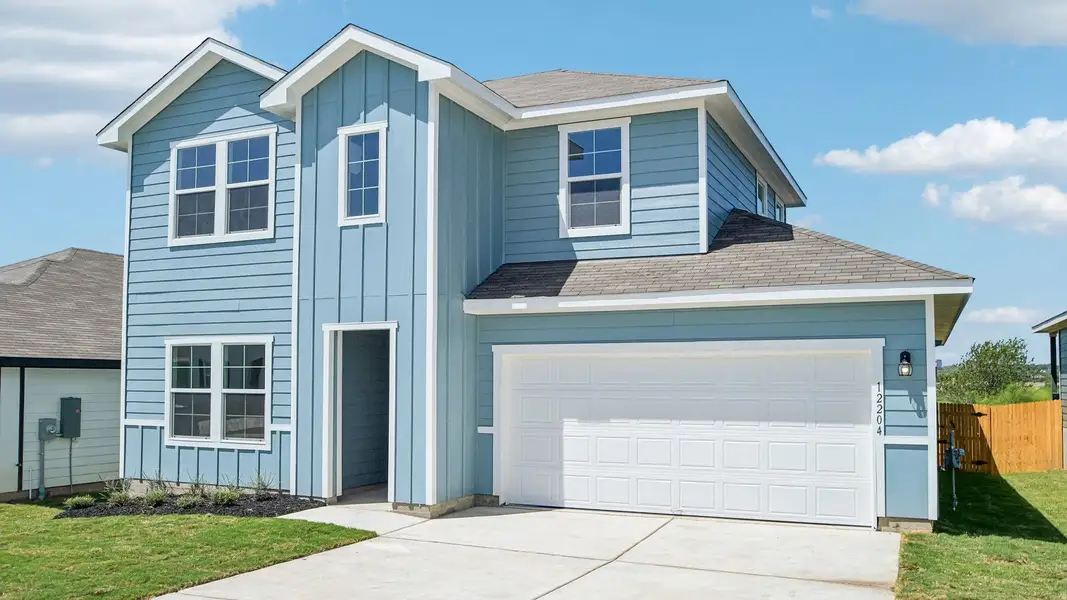 Front exterior of a new home in Durango, Mustang Ridge, TX, highlighting curb appeal (Image 1). Front exterior of a new home in Durango, Mustang Ridge, TX, highlighting curb appeal (Image 1).