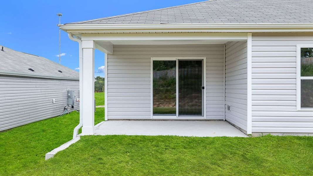 Exterior details and patio area of a home in Lightwood Cottages, Moore (Image 3).