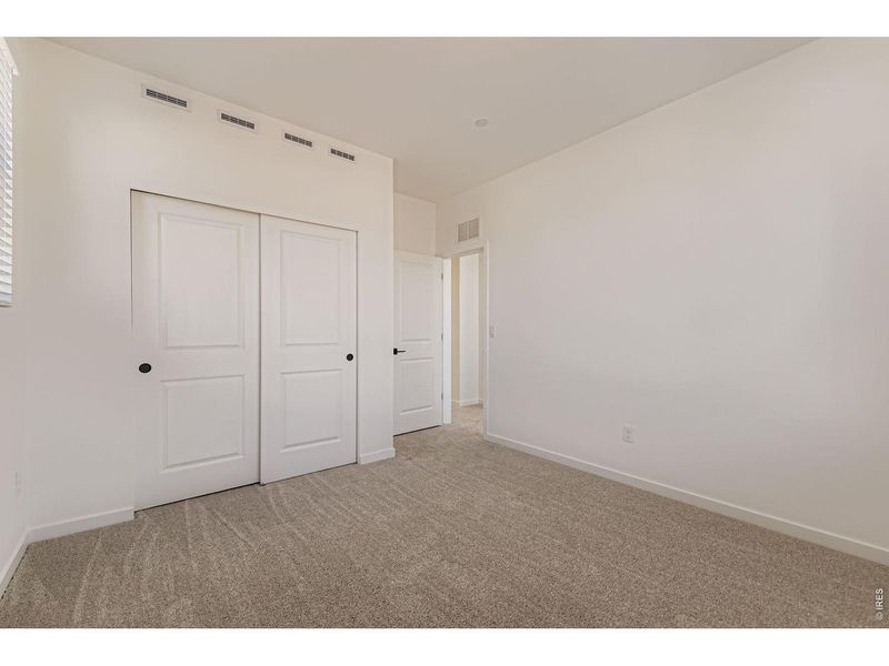 Spacious, unfurnished interior of a new home in Parkside West at Baseline, Broomfield (Image 21).