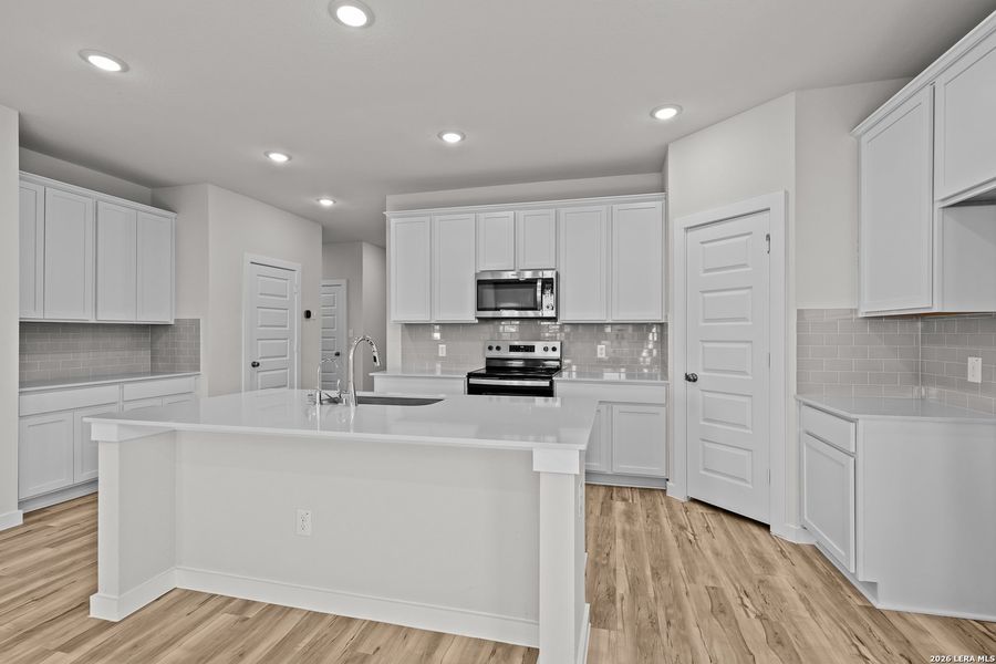 Furnished interior view inside a new home in Cinco Lakes, San Antonio (Image 7).