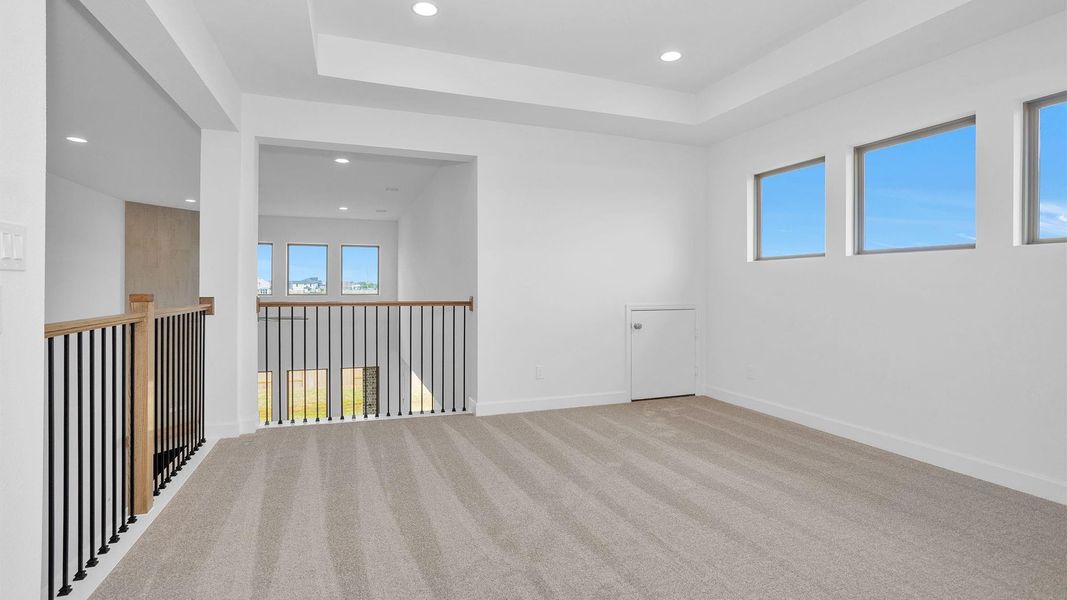 Spacious, unfurnished interior of a new home in Legacy Prairie at Katy Court, Katy (Image 10).
