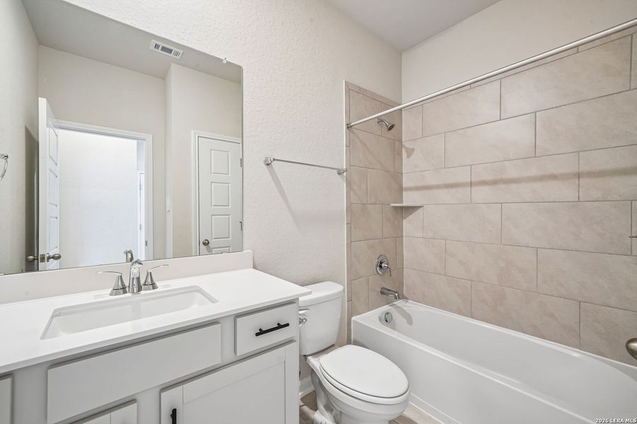 Furnished interior view inside a new home in Thomas Pond, San Antonio (Image 6).