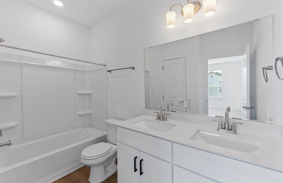Furnished interior view inside a new home in Northpoint at Old Settlers, Round Rock (Image 6).