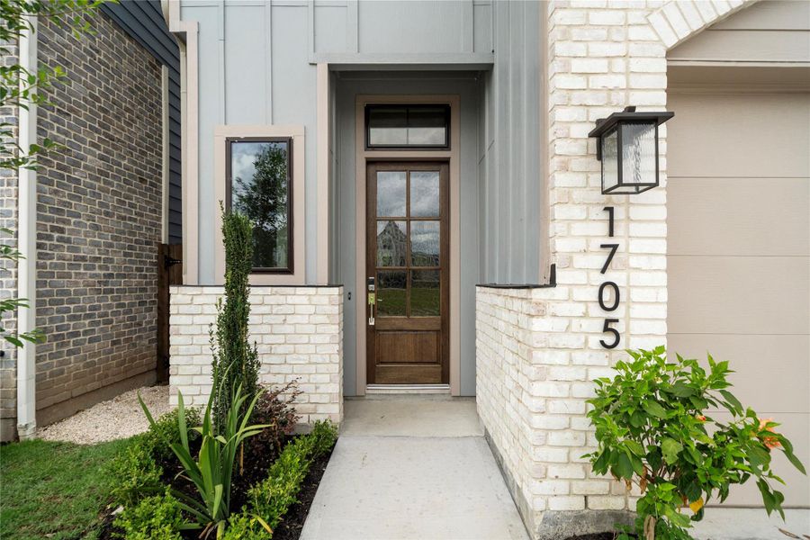 Exterior details and patio area of a home in Spring Valley Creek, Houston (Image 3).