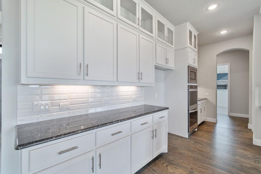 Kitchen | Concept 3634 at Hidden Creek Estates in Van Alstyne, TX by Landsea Homes