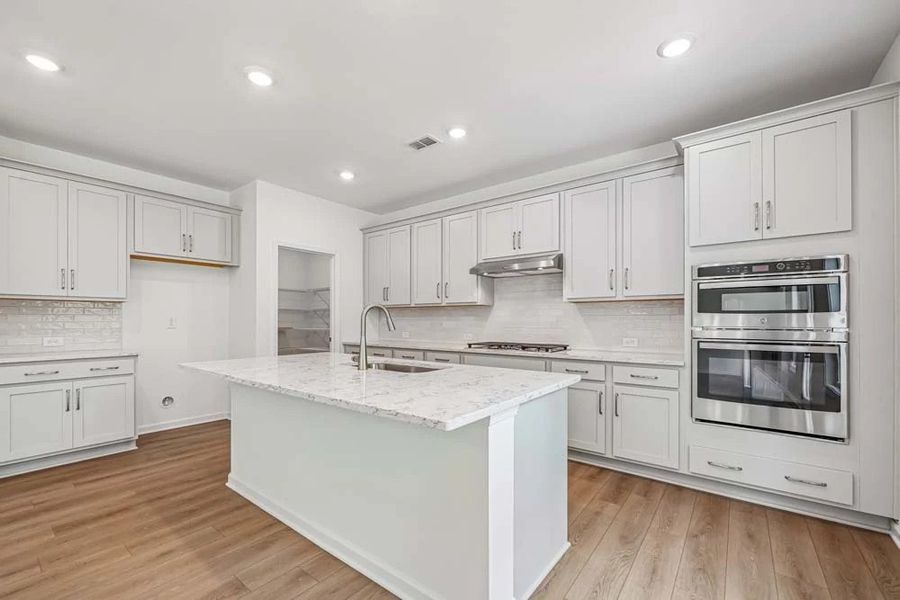 Representative Photo: Kitchen featuring Milan Collection Finishes
