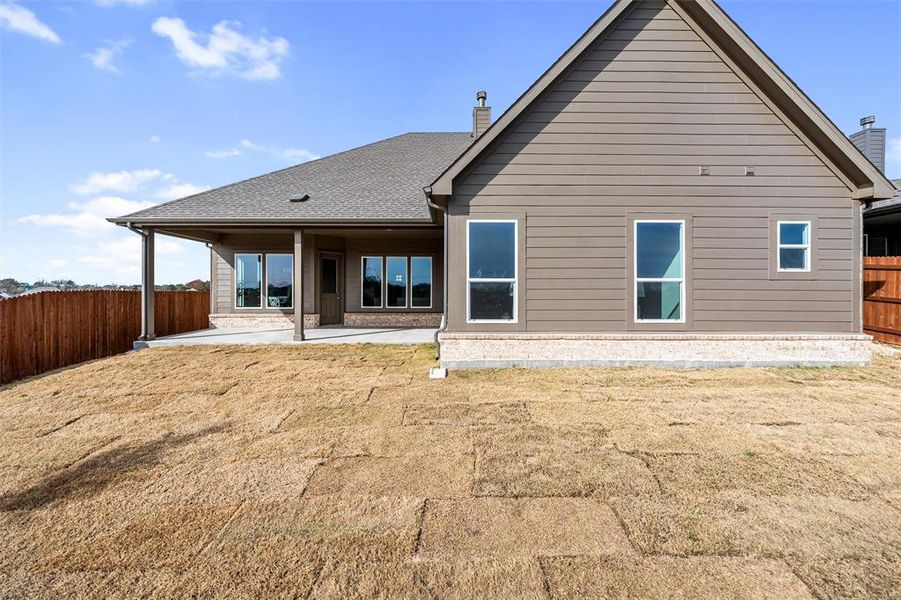 Exterior details and patio area of a home in Waterford Park, Weatherford (Image 26).