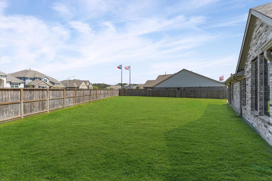 Exterior details and patio area of a home in The Trails, New Caney (Image 4). Exterior details and patio area of a home in The Trails, New Caney (Image 4).