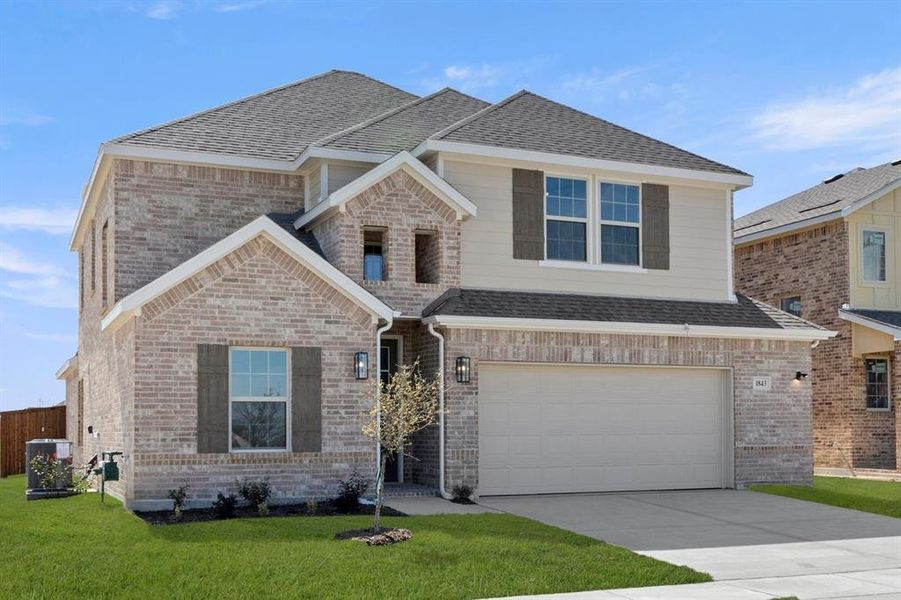 Front exterior of a new home in Las Lomas, Forney, TX, highlighting curb appeal (Image 1). Front exterior of a new home in Las Lomas, Forney, TX, highlighting curb appeal (Image 1).