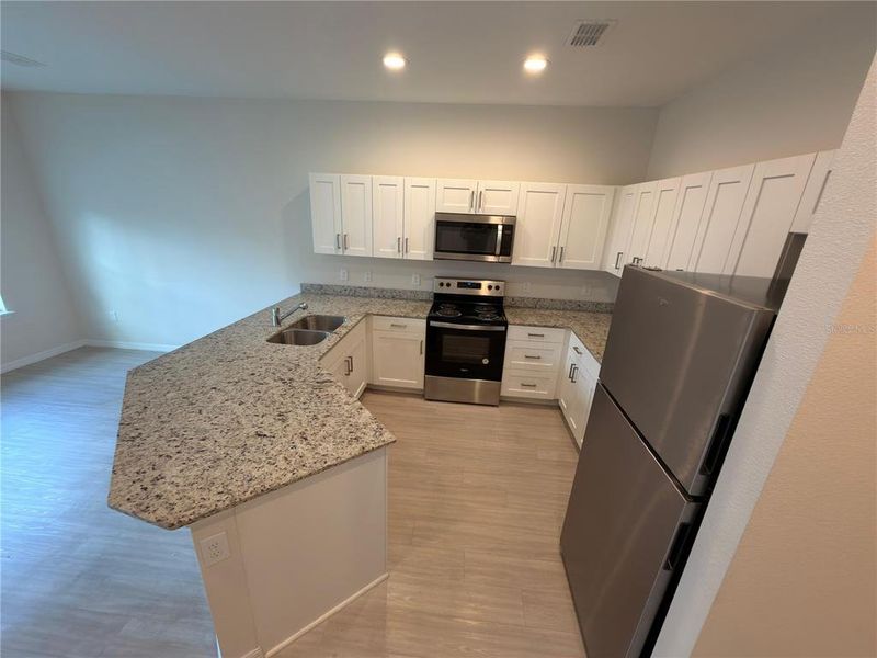 Furnished interior view inside a new home in , Kissimmee (Image 8). Furnished interior view inside a new home in , Kissimmee (Image 8).