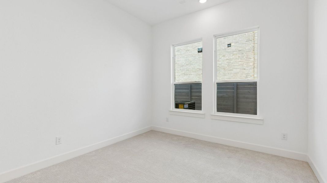 Representative unfurnished interior of a home built from the Chapelle III by Normandy Homes in Rainwater Crossing, Celina (Image 12).