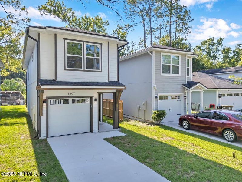 Front exterior of a new home in , Jacksonville, FL, highlighting curb appeal (Image 25).