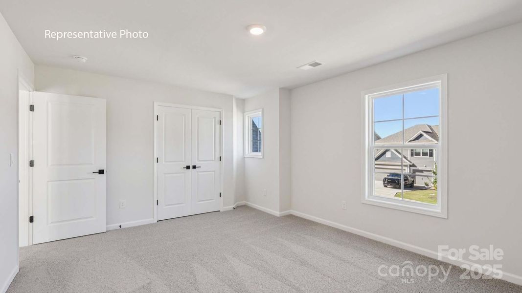 Spacious, unfurnished interior of a new home in Sanctuary at Southgate, Indian Trail (Image 23).
