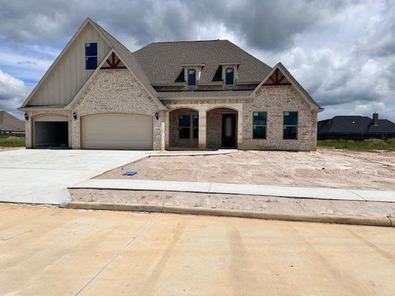 Front exterior of a new home in , Lumberton, TX, highlighting curb appeal (Image 2). Front exterior of a new home in , Lumberton, TX, highlighting curb appeal (Image 2).