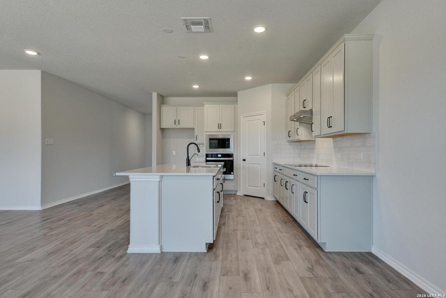 Furnished interior view inside a new home in Hennersby Hollow, San Antonio (Image 6).