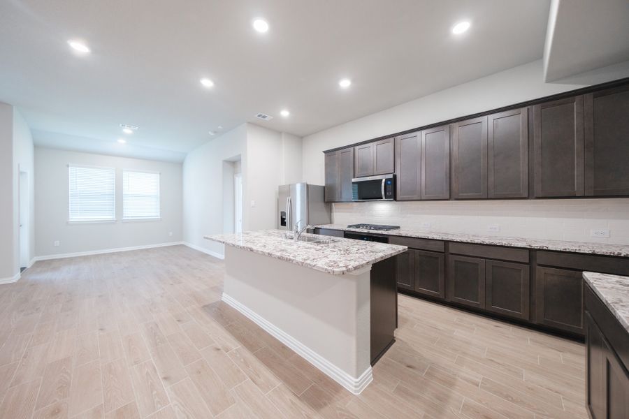 Furnished interior view inside a new home in The Villages of Hurricane Creek, Anna (Image 9).