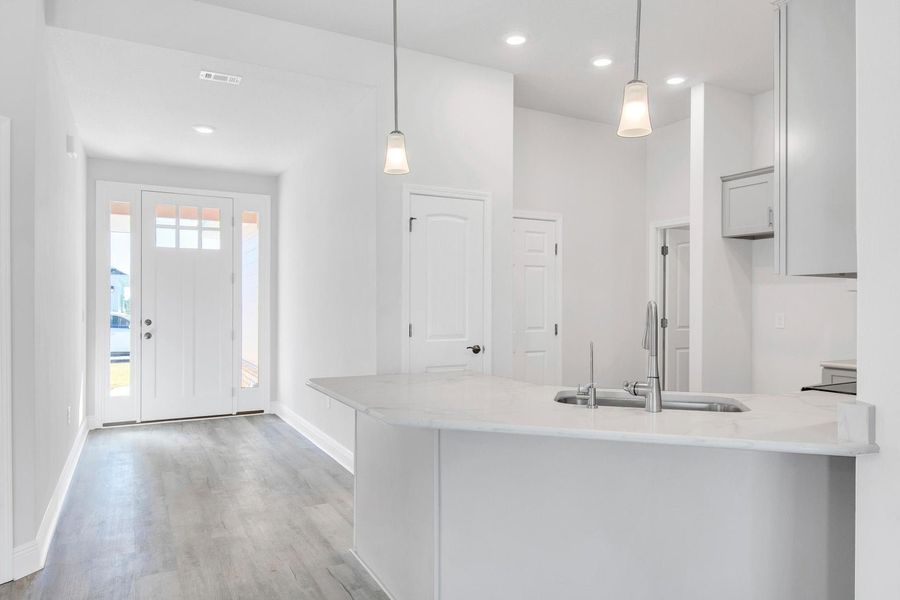 Furnished interior view inside a new home in The Bluffs at Lafayette, Freeport (Image 5).