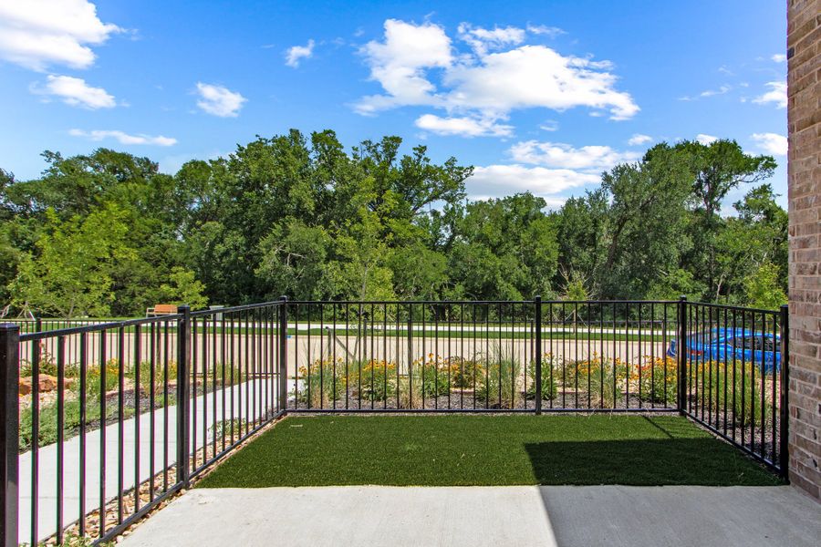 Exterior details and patio area of a home in Cottonwood Creek, Rowlett (Image 28).