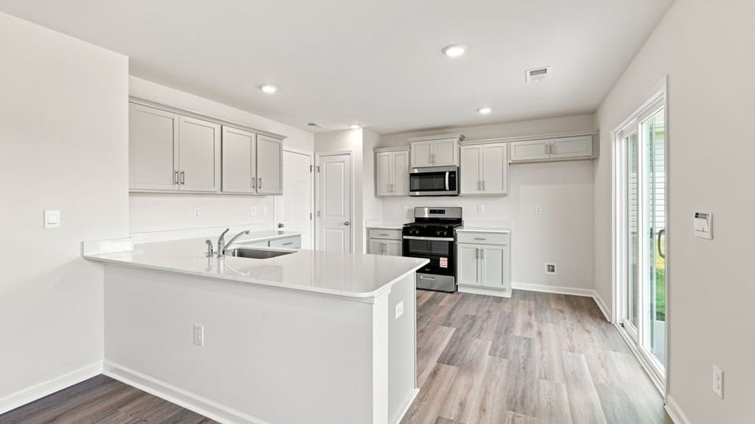 Furnished interior view inside a new home in Tyger Pines, Moore (Image 6).