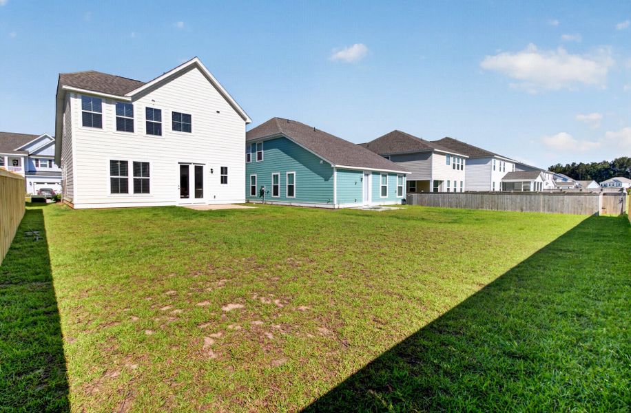 Exterior details and patio area of a home in High Point at Foxbank, Moncks Corner (Image 27). Exterior details and patio area of a home in High Point at Foxbank, Moncks Corner (Image 27).