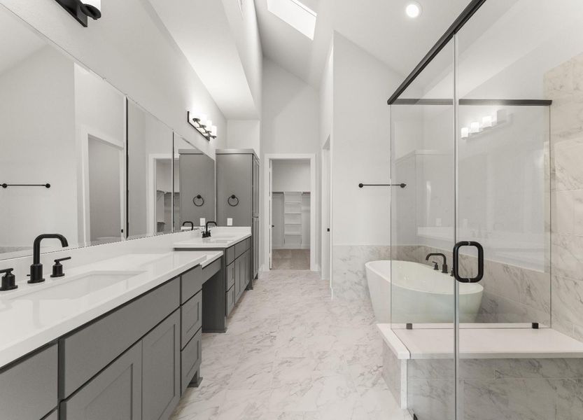 Fabulous Primary Bath with Skylight, Double Sinks, Separate Shower, Freestanding Tub, and Linen Cabinet! Fabulous Primary Bath with Skylight, Double Sinks, Separate Shower, Freestanding Tub, and Linen Cabinet!