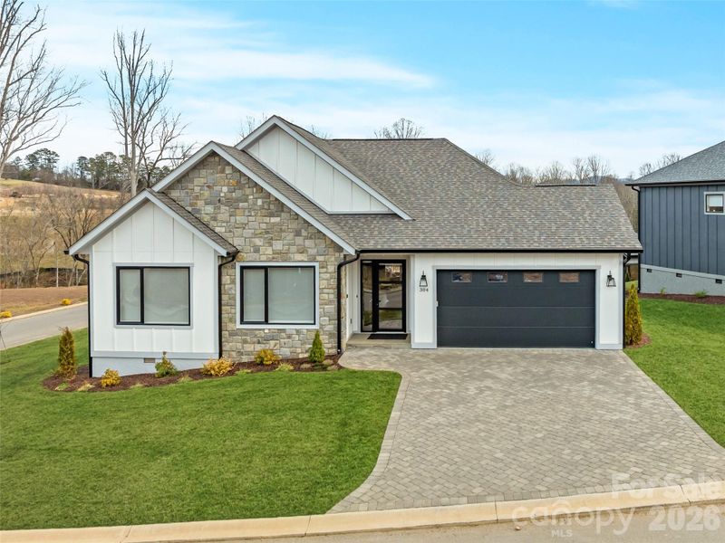 Front exterior of a new home in , Arden, NC, highlighting curb appeal (Image 23).