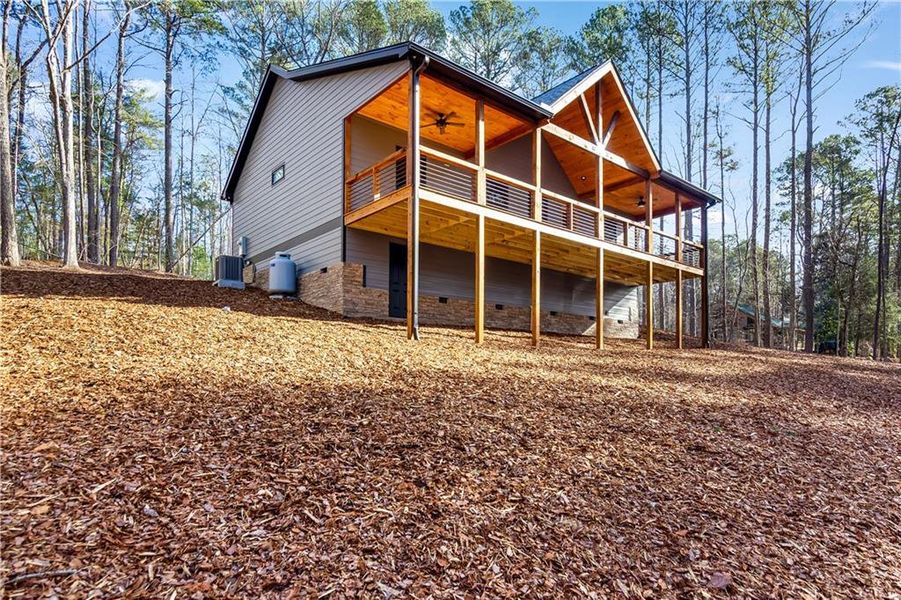 Exterior details and patio area of a home in , Ellijay (Image 30).