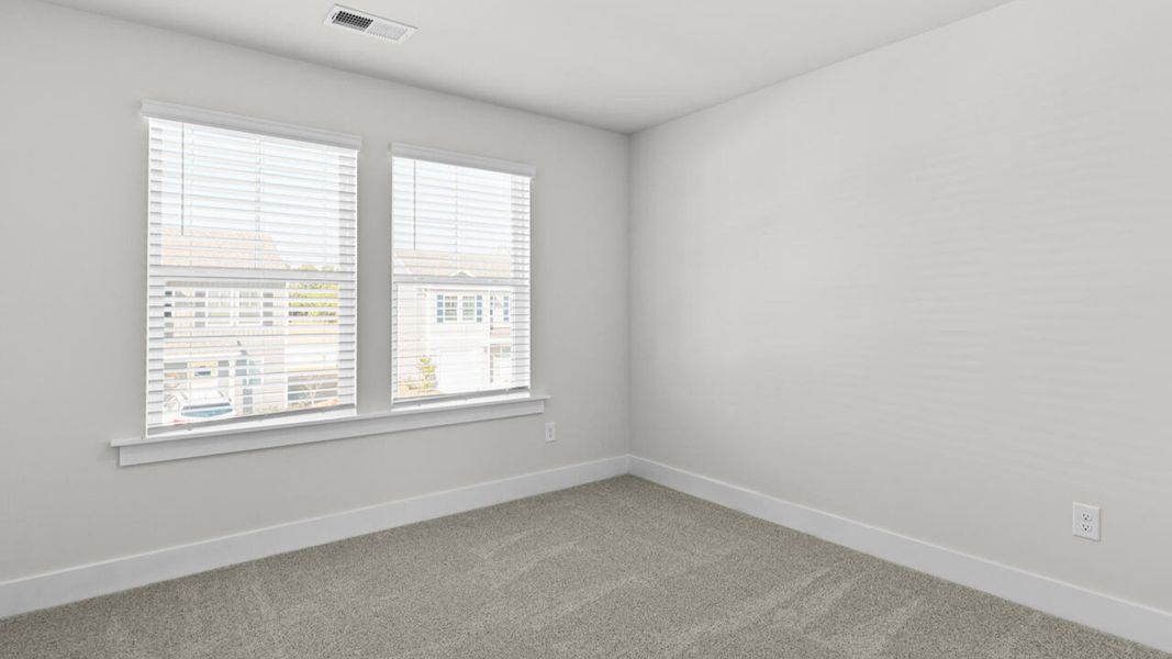 Spacious, unfurnished interior of a new home in Townes at Seabrooke, Leland (Image 31).