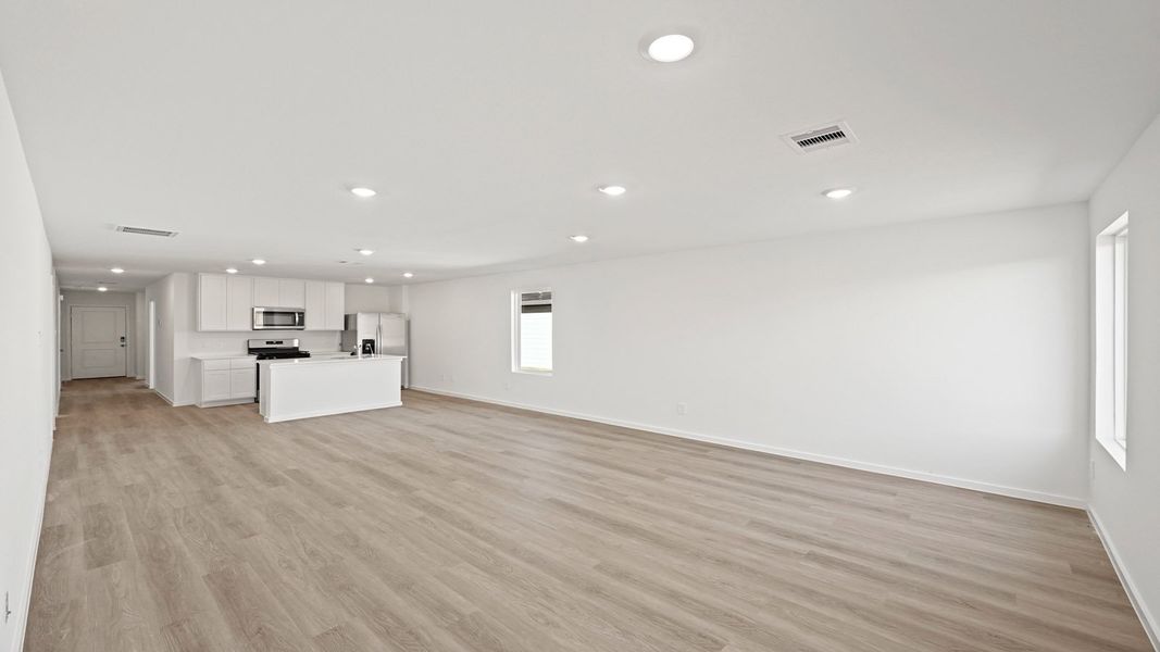 Representative unfurnished interior of a home built from the Carson by D.R. Horton in Lexington Heights, Willis (Image 13).