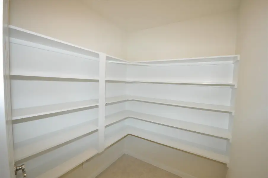 Spacious, unfurnished interior of a new home in Pedregal, League City (Image 33).