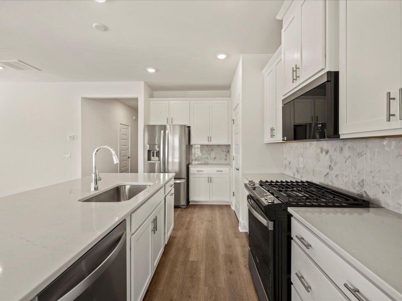Furnished interior view inside a new home in The Coves at Lakes of Cane Bay, Summerville (Image 7). Furnished interior view inside a new home in The Coves at Lakes of Cane Bay, Summerville (Image 7).