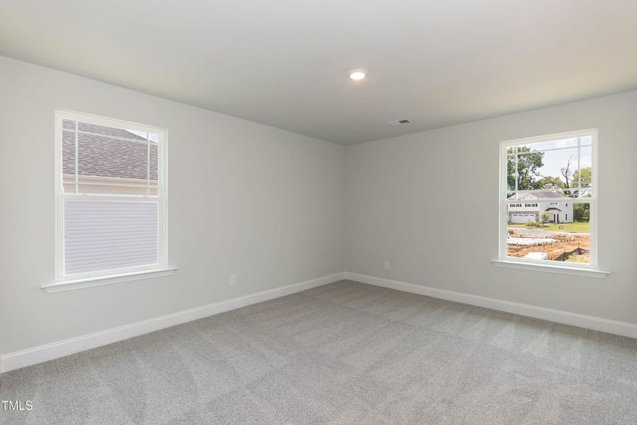 Representative unfurnished interior of a home built from the 2709 by Adams Homes in The Grove at Ballard, Jacksonville (Image 30).