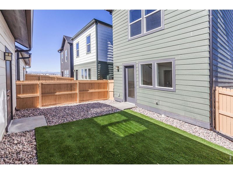 Exterior details and patio area of a home in Prairie Song Cottages, Windsor (Image 4).