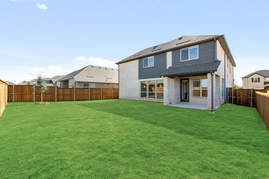 Exterior details and patio area of a home in Creekview Meadows, Pilot Point (Image 22).