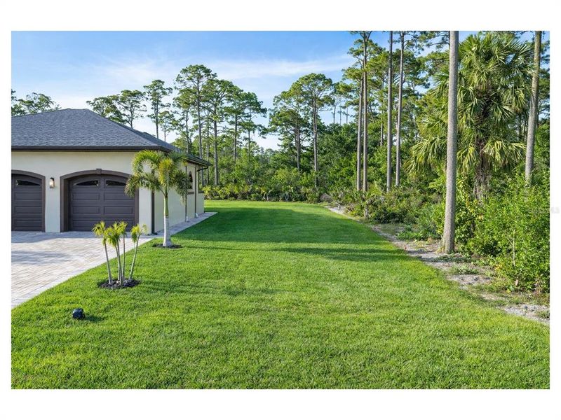 Exterior details and patio area of a home in , Port Charlotte (Image 50).