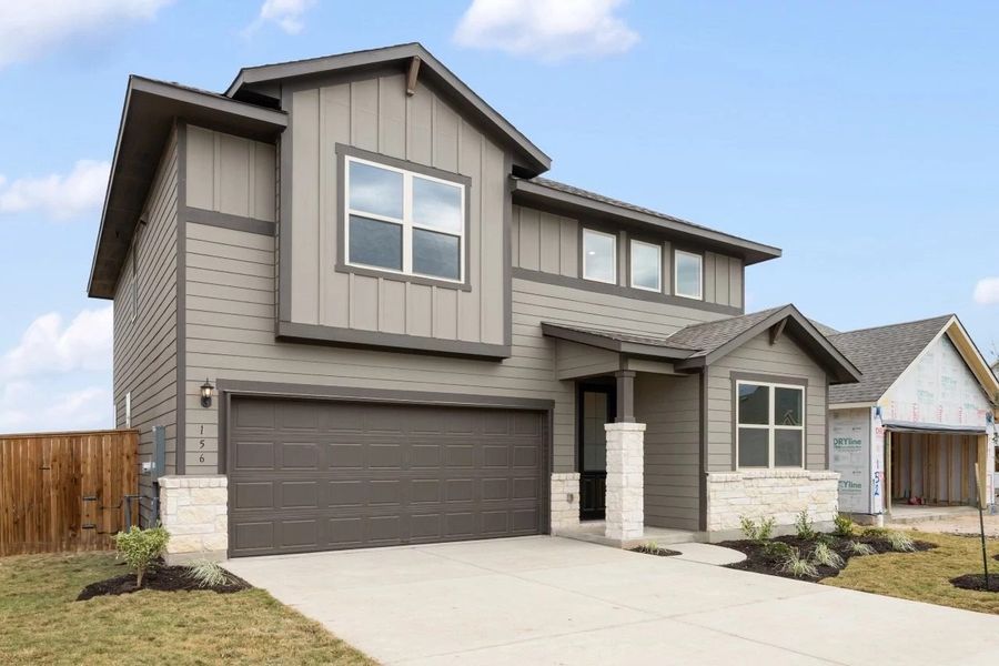 Front exterior of a new home in Patterson Ranch, Georgetown, TX, highlighting curb appeal (Image 22).
