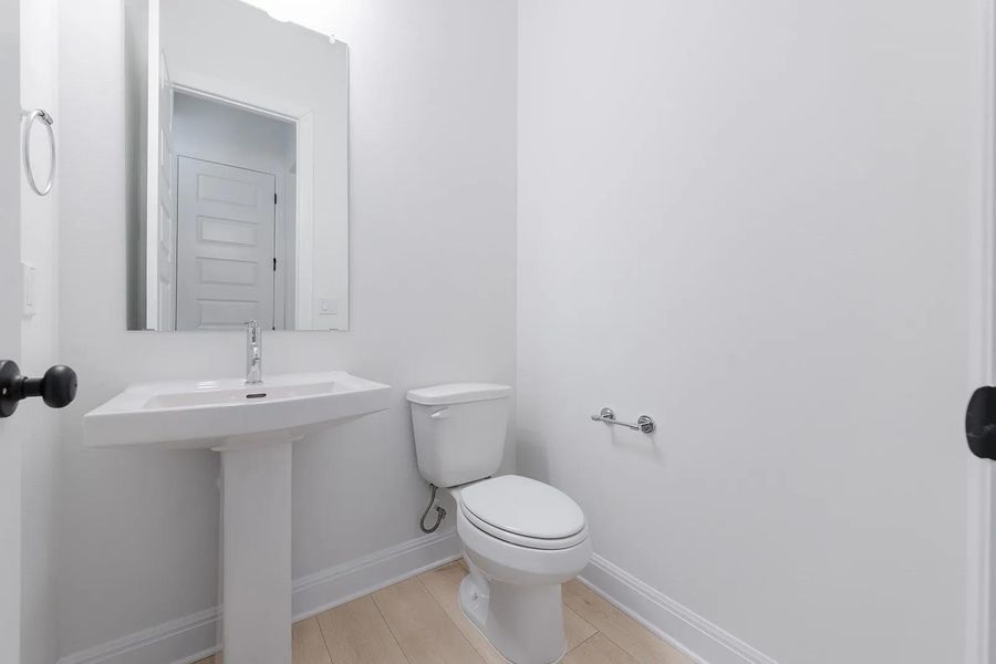 Furnished interior view inside a new home in Parmer Ranch 60, Georgetown (Image 12).