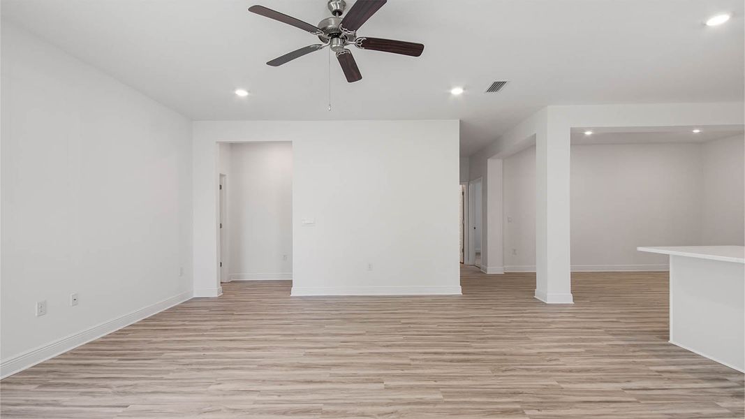 Representative unfurnished interior of a home built from the Kennedy by D.R. Horton in Bayside at Ward Creek, Panama City Beach (Image 22).