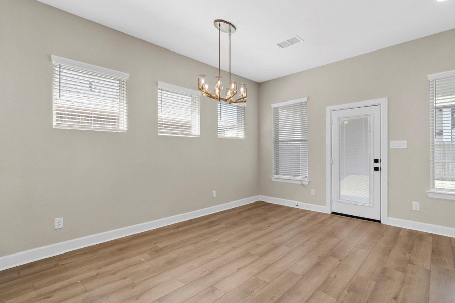 Causal dining space with natural light and access to the bakcyard