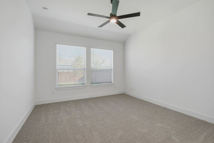 Representative unfurnished interior of a home built from the Sage by Chesmar Homes in Stillwater Ranch, Buda (Image 9).